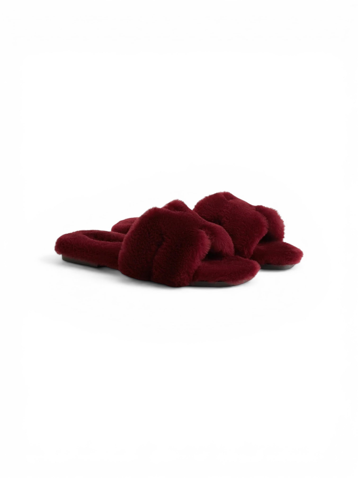Sandalia Oran de Hermès en piel de borrego Rouge H