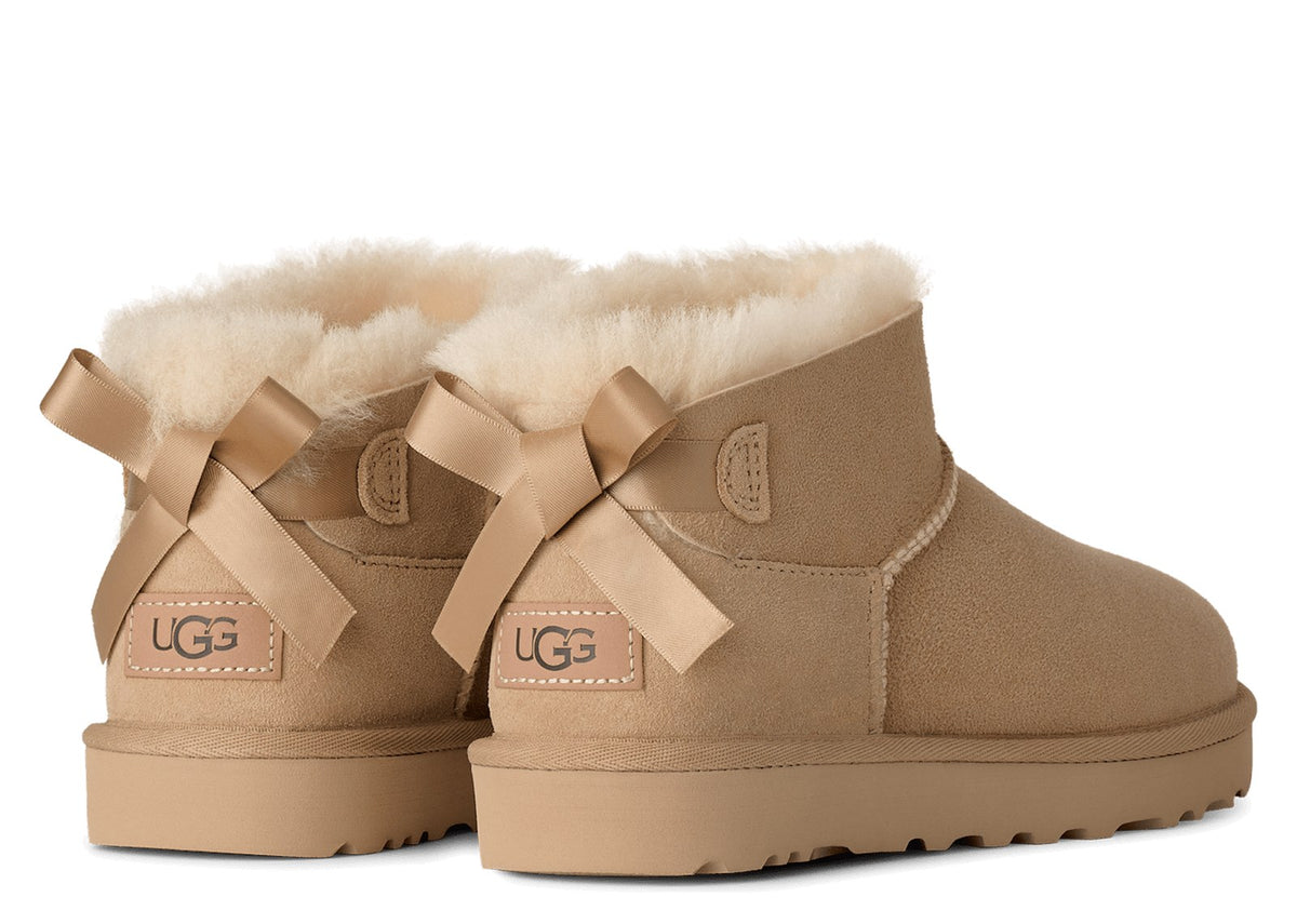 UGG Ultra Mini Bailey Bow Boot Sand (W) 3