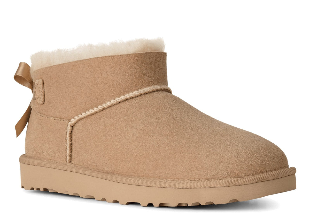 UGG Ultra Mini Bailey Bow Boot Sand (W) 5